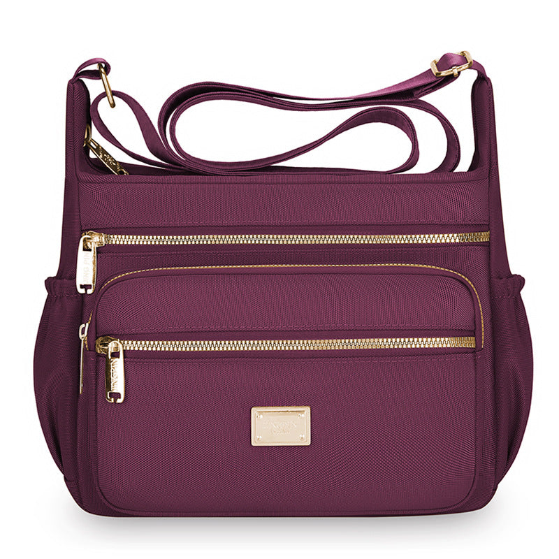 Women's bags are fashionable and simple, large-capacity messenger bags, multi-layer storage, travel shoulder bags, going out for commuting, middle-aged mother bags.