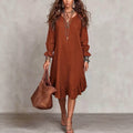 Women's vacation-ready slip dress: relaxed fit, v-neck, slit hem, ruffle trim, midi length - wholesale available