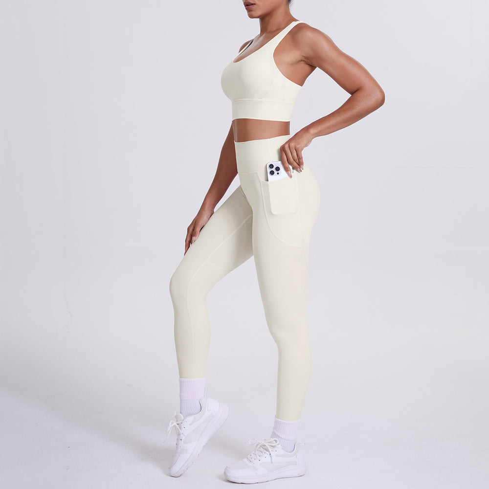 New arrival cross beautiful back cloud sense tight yoga suit suit women's high waist hip pocket sports fitness suit two-piece set