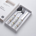 Luxury ceramic handle cutlery set - high-end stainless steel dinnerware gift box for home use - western style knives, forks, and spoons - perfect for gifting