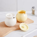 Accessible luxury lard filled ceramic kitchen seasoning storage jar multi-purpose seasoning jar with spoon for home chili jar wholesale