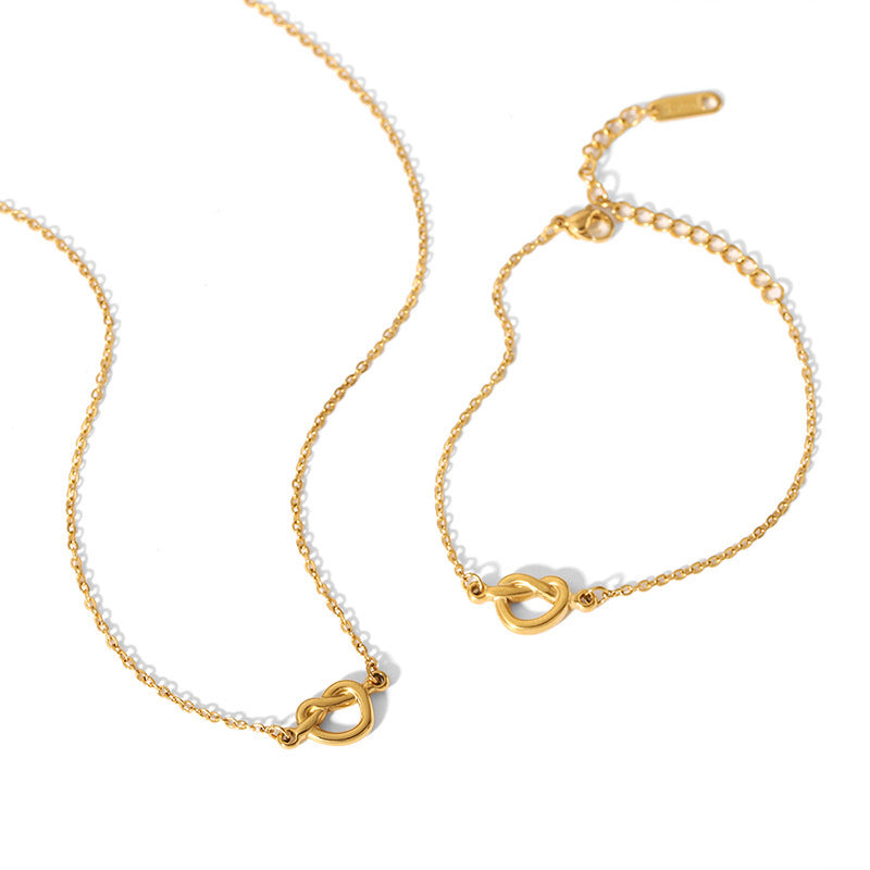 European and american fashion ins minimalist 18k gold plated knotted necklace titanium steel short rope cross pendant four-piece jewelry set