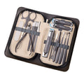 Stainless steel manicure & pedicure tool set - 9 piece kit: includes nail clippers, eyebrow scissors, earwax removal tool, and nail file - wholesale