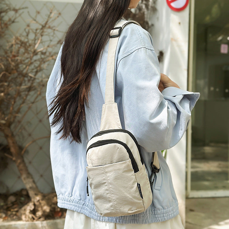 Small breast bag men's simple mini small satchel men's summer casual mobile phone bag carry-on bag men's messenger bag women