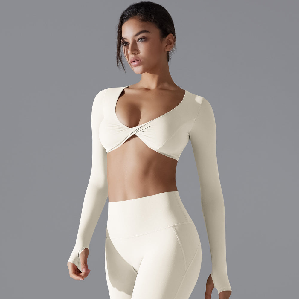 New women's activewear long sleeve top: deep v-neck, slim fit, breathable, trendy cropped yoga top for outdoor workouts