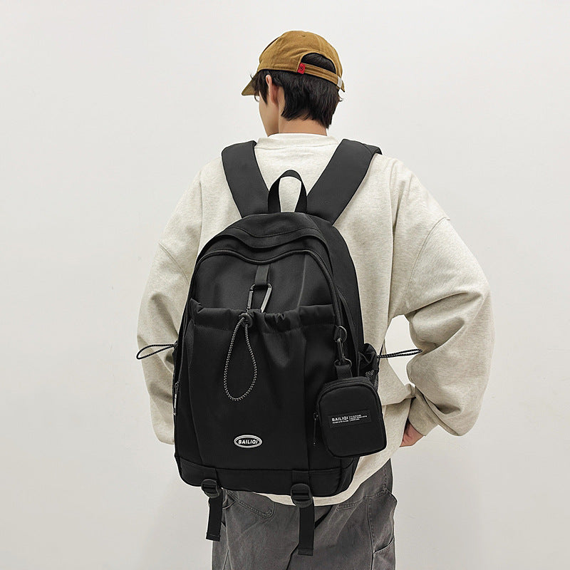 Trendy high-street water-resistant lightweight backpack - 26l large capacity student schoolbag, durable with free headphone pouch