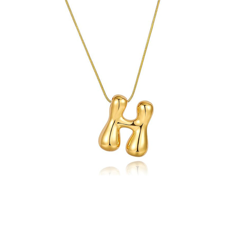 Amazon bestseller: premium bubble 26-letter gold pearlized necklace pendant - stylish women's accessory