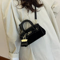 High-end women's bag, 2025 new arrival, vintage-inspired, niche design, lock closure bag, trendy and versatile for autumn, can be used as a shoulder bag, crossbody bag, or handbag