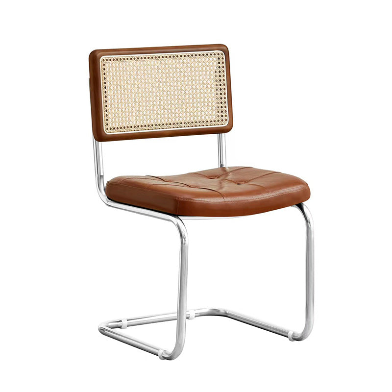 Rattan dining chair - luxury, high-end design with curved backrest - modern minimalist woven rattan chair