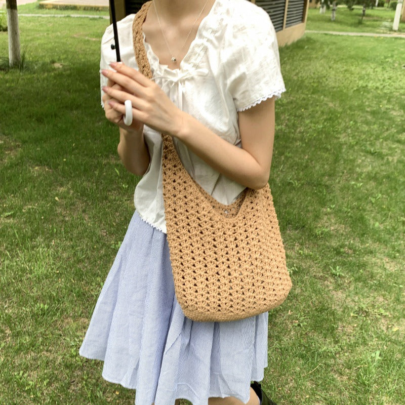 New fashionable solid color knitted hollow large-capacity shoulder bag Korean handmade tote bag holiday wind beach women's bag
