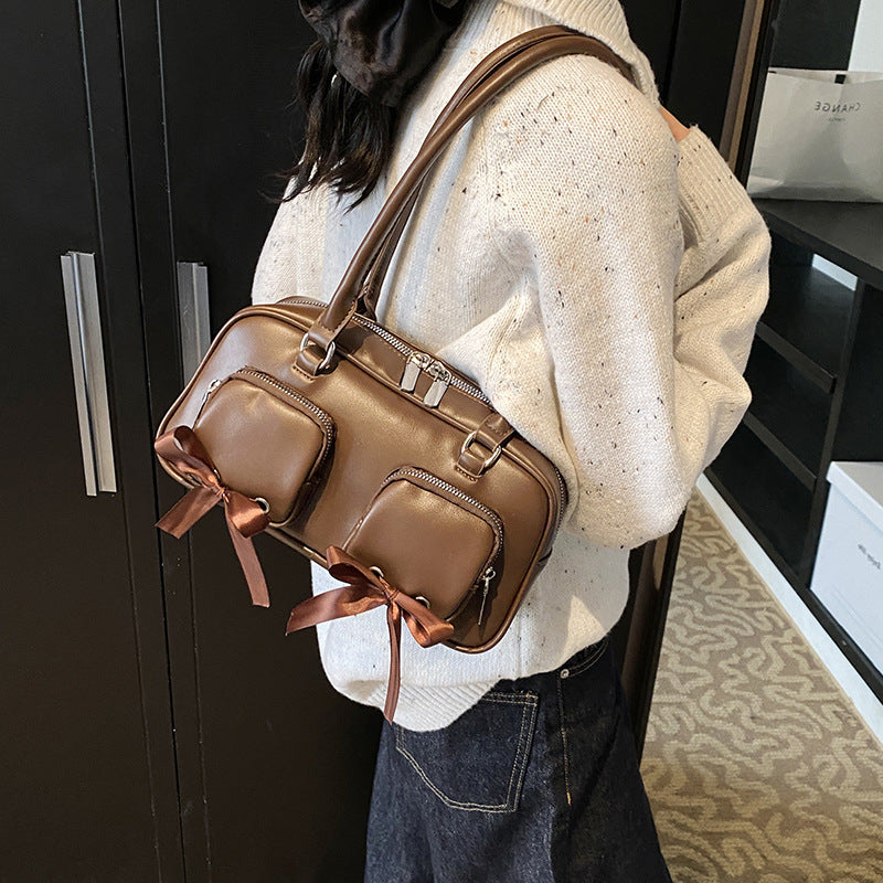 Simple retro underarm bag women's 2025 winter new Korean version niche portable commuter shoulder bag
