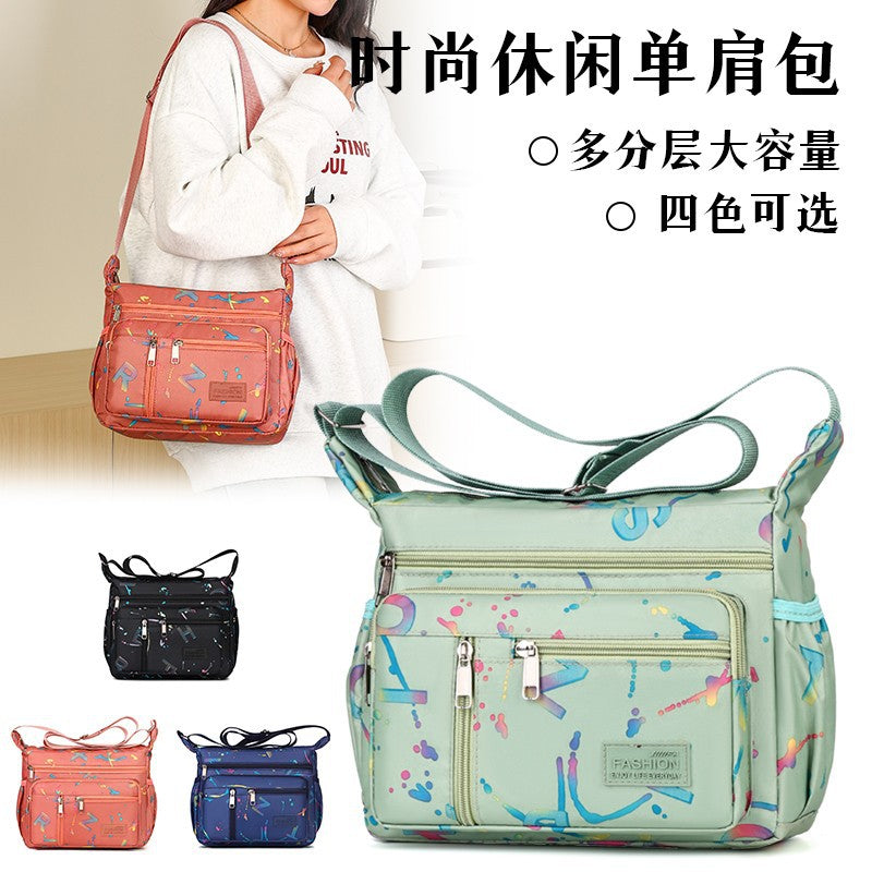 New fashionable versatile shoulder bag large capacity letter printing leisure travel messenger bag multi-layer storage mother bag