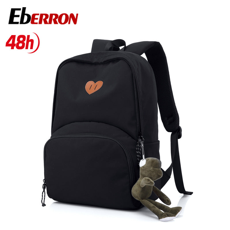New simple and versatile schoolbag, high-value dirt-resistant belt, doll large-capacity backpack, male and female middle school student backpack.