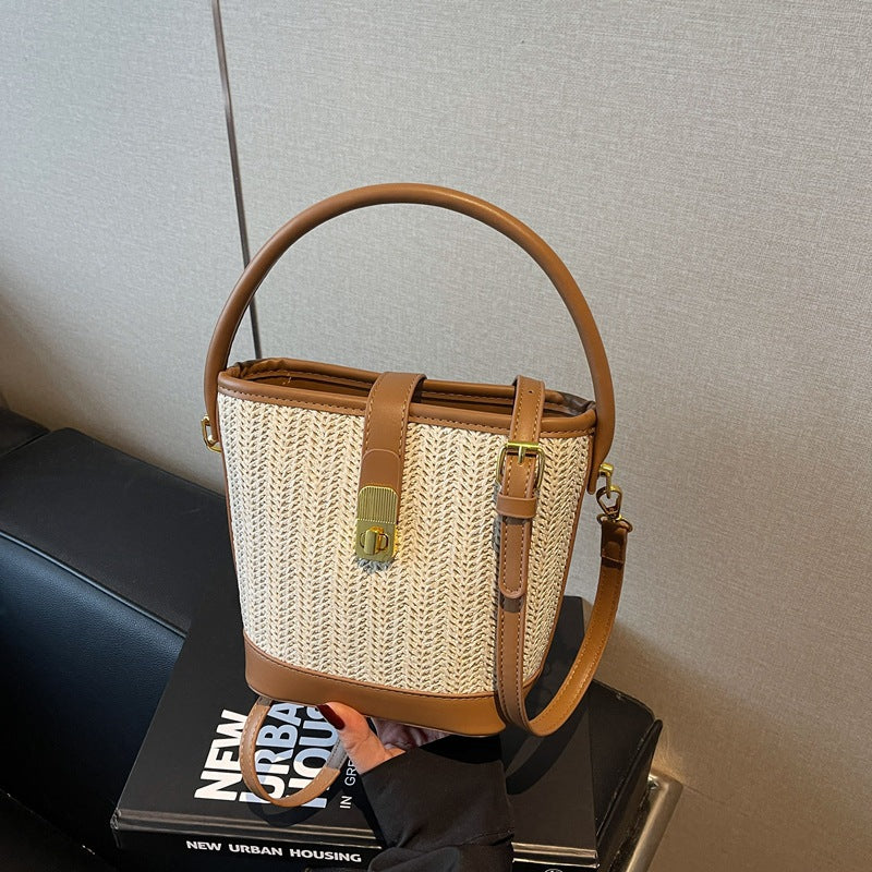 Foreign single woven straw bag women's 2025 new niche design messenger bag versatile high-end portable bucket bag