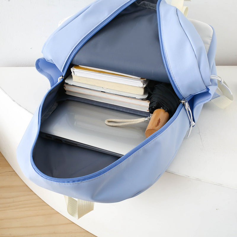Cross-border new fashion trend backpack casual backpack large-capacity travel essential bag primary and secondary school students schoolbag