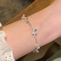 Elegant butterfly bracelet with crushed silver beads - 2026 new arrival, light luxury, niche design, exquisite and high-end style, wholesale for women