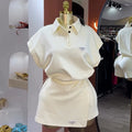 European and american cross-border women's fashion:  autumn new collection - casual polo collar loose-fit short sleeve top and asymmetrical mini skirt set