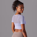 New arrival nude mesh cut out short-sleeved fake two-piece yoga top all-in-one coaster bubble wrap push-up fitness beautiful back