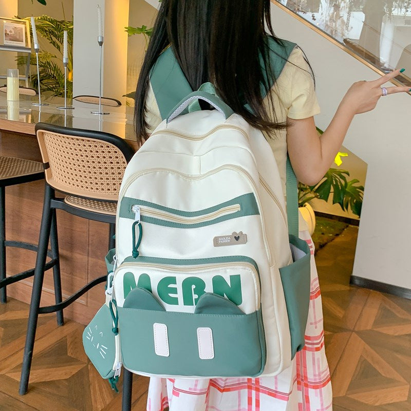 New cute and sweet backpack, junior high school student schoolbag for women, large capacity, small fresh and anti-splashing light backpack.