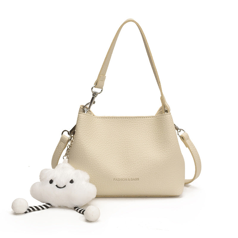 Foreign trade advanced sense bucket bag 2025 summer new niche design light daily commuting hand carry messenger bag