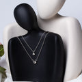 Stacked necklace wholesale european and american cross-border autumn and winter jewelry women's creative simple electroplated small round diamond circle sweater chain