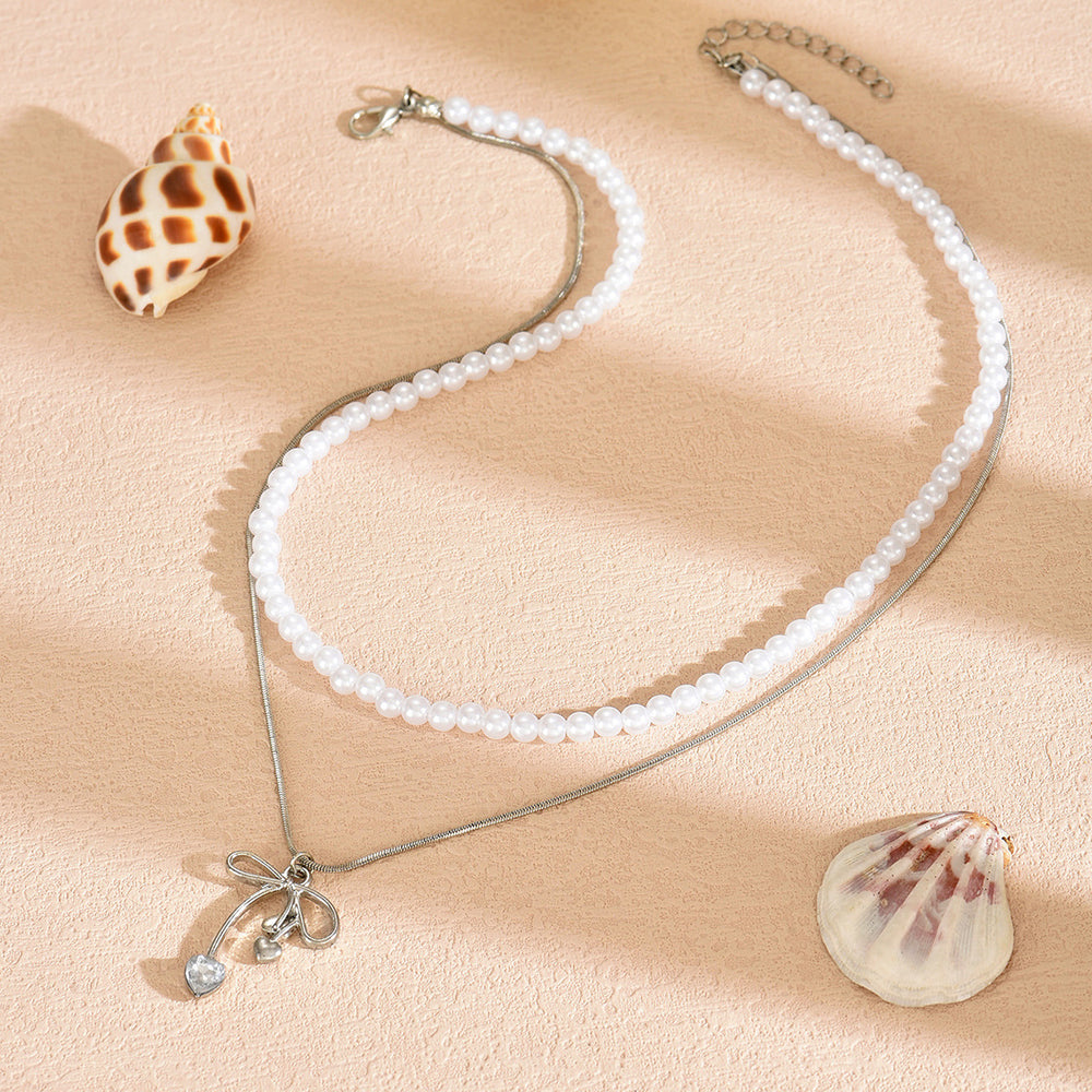 French style stacked pearl necklace wholesale european and american cross-border retro necklace accessible luxury high-end bow clavicle chain for women