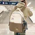 2025 new casual large capacity backpack for middle school, high school, and college students - women's double shoulder bag, men's color block large backpack