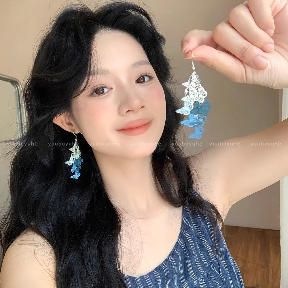 Super fairy cut out butterfly tassel earrings for women, accessible luxury, classy sense, forest style earrings, exaggerated, unique and beautiful earrings