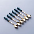 Dark green gold spoon