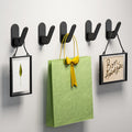 No-drill single hook adhesive hook for wall mounting - ideal for hanging clothes, hats, and storage in bathrooms, kitchens, and behind doors. heavy-duty weight capacity