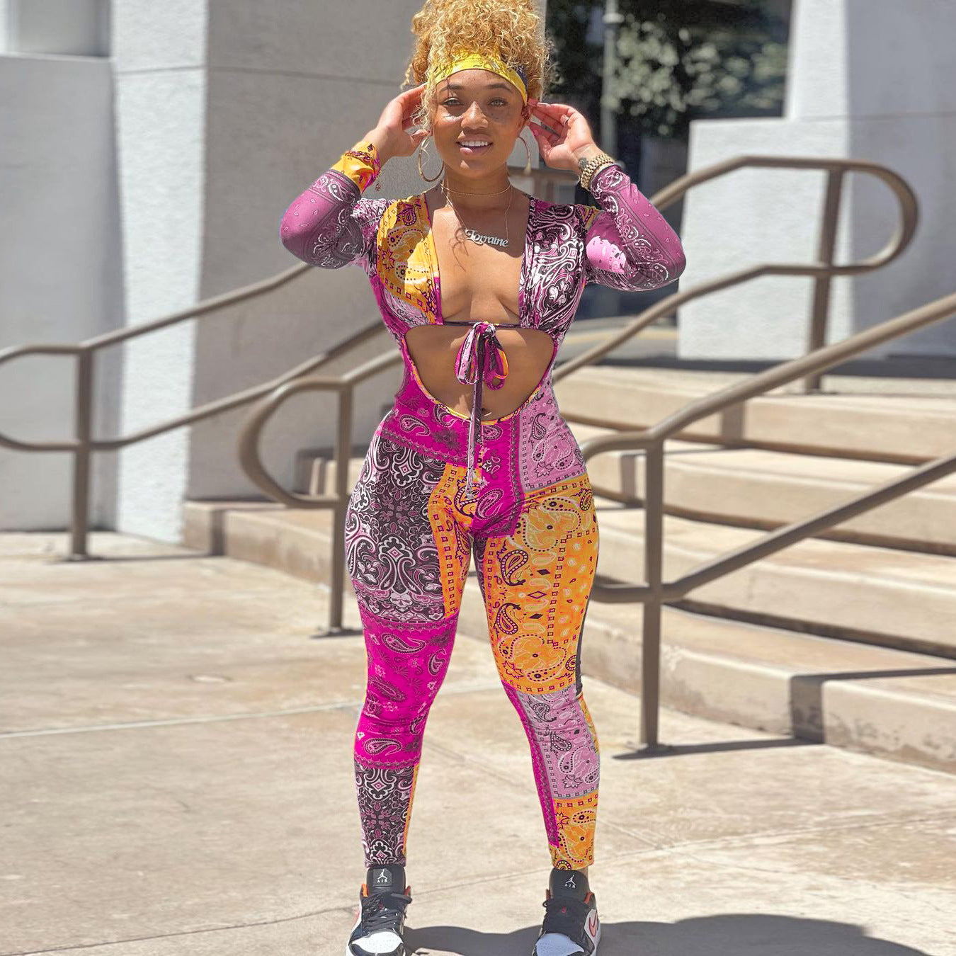 S390187 European and American women's clothing wholesale sexy slim print hollow strap one-piece trousers pencil trousers women