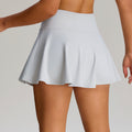Fashionnew arrival sports tennis skirt outdoor golf flap pocket pants sports skirt fake two-piece fashion tape yoga skirt