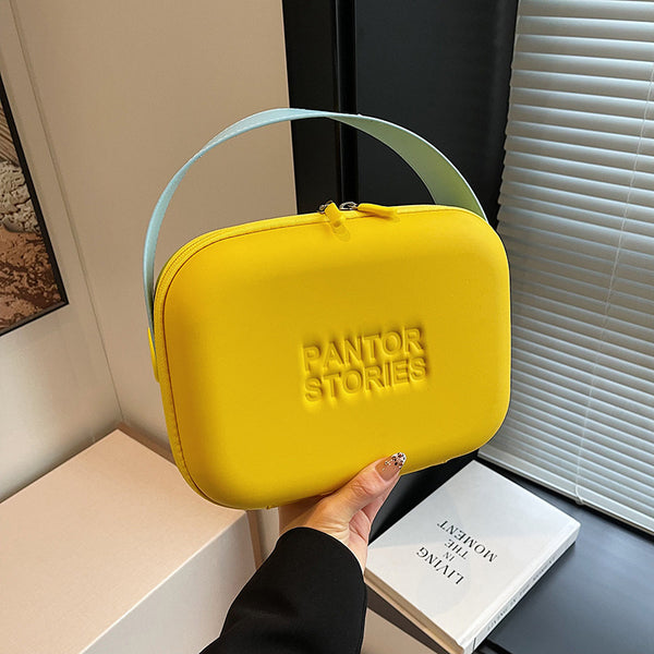 Foreign trade women's bags, new fashionable women's portable cosmetic bags, silicone anti-splashing cosmetic cases, candy-colored luggage bags.