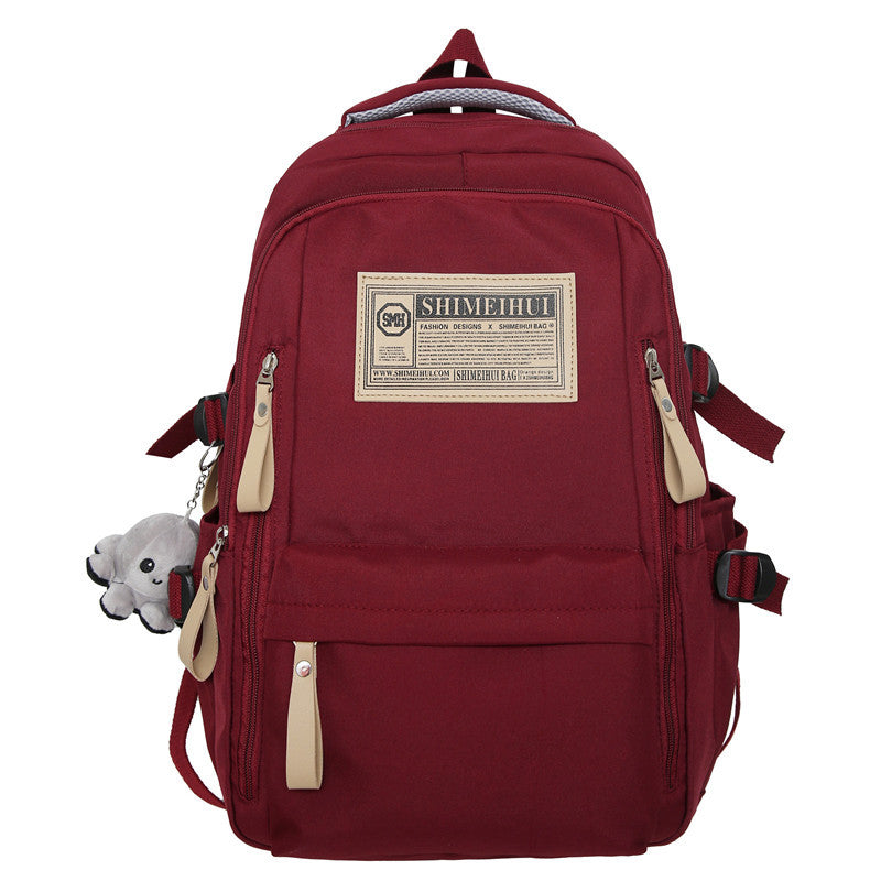Spring and summer simple travel backpack computer backpack casual solid color ultra-light junior high school students large-capacity schoolbag