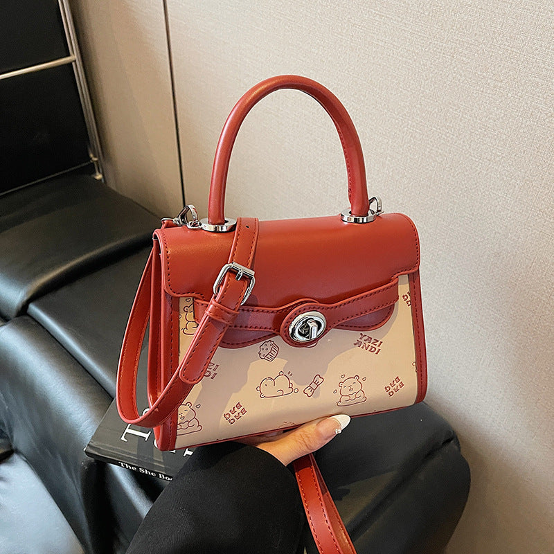 Simple contrasting color small bag women's 2025 summer new portable small square bag advanced super fire niche texture messenger bag