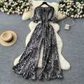 Summer vacation chic: effortless & mature casual v-neck short sleeve jumpsuit with elastic waist, high waist, slimming wide leg, and printed design