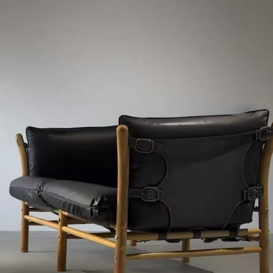 Leather upholstered designer solid wood b&b living room saddle leather chair wabi-sabi style sofa frameless b&b commercial