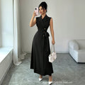 summer new arrival: black sleeveless dress with suit collar, cinched waist, and tie detail - long work dress