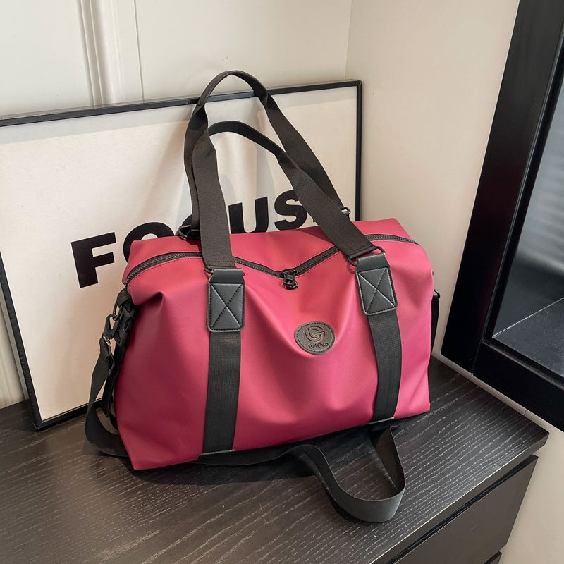 New travel bag women's travel portable hand luggage bag Korean version large-capacity messenger sports fitness bag travel bag