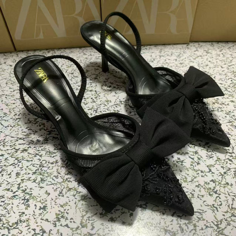 Za's 2025 new women's low-heel pumps: elegant, pointed-toe, ankle-strap flats with black bow detail