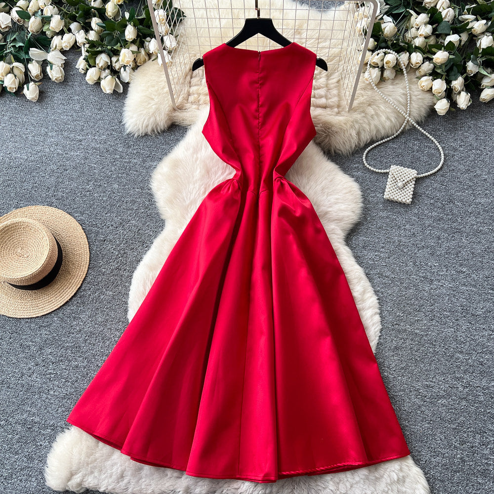 French red sleeveless midi dress - summer collection: slimming a-line with cinched waist, exquisite metal buckle detail, effortlessly chic