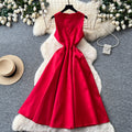 French red sleeveless midi dress - summer collection: slimming a-line with cinched waist, exquisite metal buckle detail, effortlessly chic