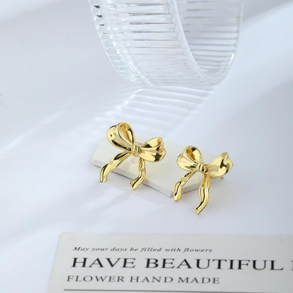 Amazon cross-border fashion light luxury gold-plated copper stud earrings, gold bow earrings, high-end women's jewelry wholesale