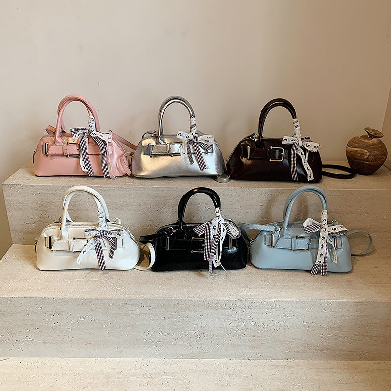 Dopamine girl hand shell bag 2025 spring and summer new Korean version shoulder bag fashion niche casual shoulder bag