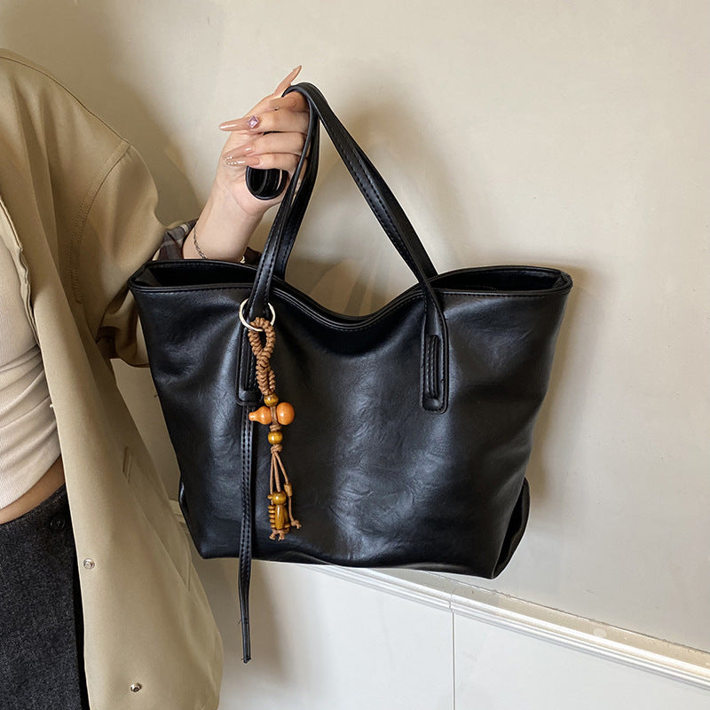 High-end retro soft leather women's bag 2026 new simple tote bag cross-border easiest for matchpure color handbag armpit bag