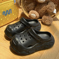 Black chunky clogs