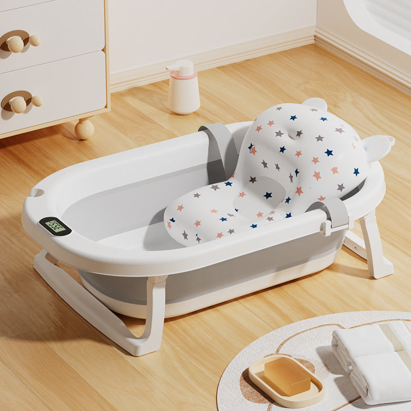 Newborn baby foldable bathtub with temperature-sensitive silicone plug, easy grip handles, and large capacity for baby bathing