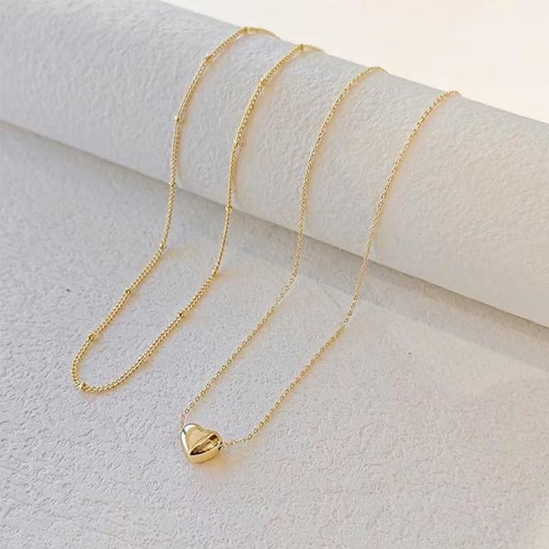 European and american cross-border hot-selling layered small fluffy heart pendant necklace heart classic simple versatile clavicle chain wholesale