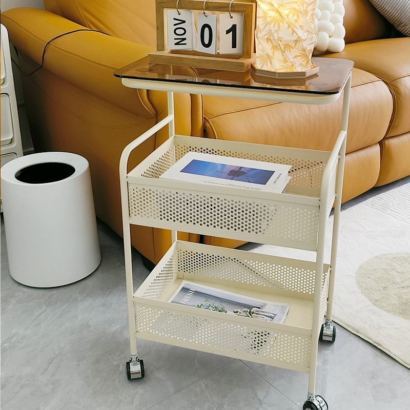 Cream style living room sofa next to several popular snacks multi-layer storage rack bedroom bedside table storage rack trolley