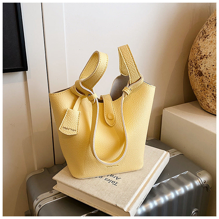 Cross-border clear sky walk goose yellow bucket bag female 2025 super fire spring and summer portable messenger bag factory delivery